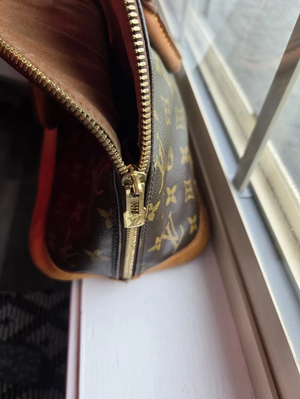 Louis Vuitton Brown Monogram Alma Handbag